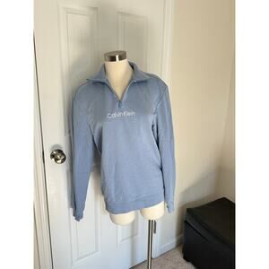 Calvin Klein light blue quarter zip pull over sweatshirt, size XS